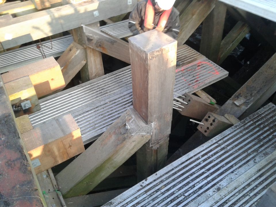 Restauration of the wooden piles and beams of the Westerstaktsel in Ostend-One of the longest wooden piers in the world